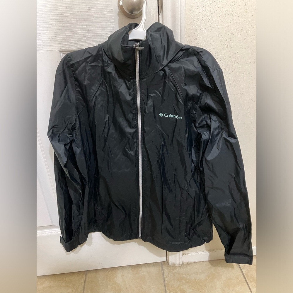 Columbia black windbreaker jacket with periwinkle blue logo, medium